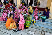 Ear piercing ceremony at Mahamuni Buddha Temple, Myanmar 